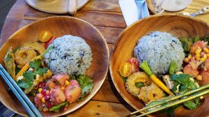 plate with vegetable tempura, a mini carrot, potato salad, and blue butterfly pea flower coconut rice at AT MARE in Zushi