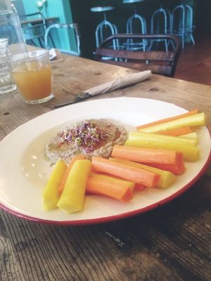 Baba ganoush with yellow and orange carrot sticks at The Seaplane Works in Rochester