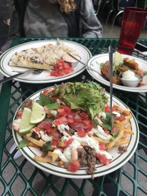 big mac quesadilla, tofu wings, & loaded fries - all 100% vegan at Garage Tacos in Binghamton