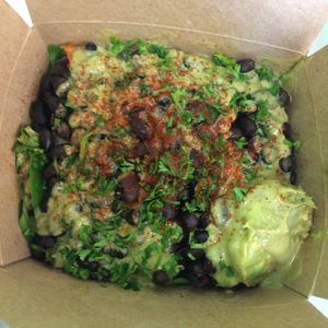spicy rice bowl with avocado sauce at grabbagreen in Maple Grove