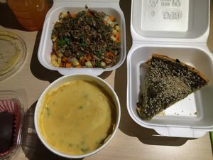 Lentil soup, rice with veggies and seeds, spinach-mushroom quiche  at Sara Green - Vegan Bistro in Bucharest