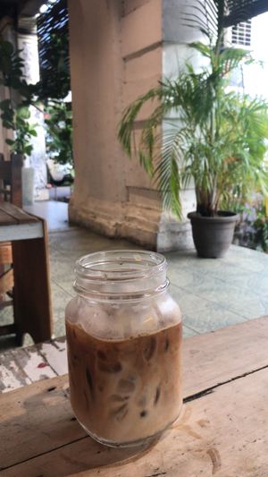 Oatmilk iced Latte  at The Mugshot Cafe in Penang