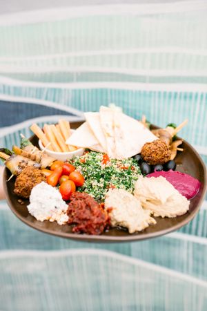 Mezze Mediterranean Platter
House Made Dips, Crackers, Pita, Fresh Heirloom Tomatoes, Falafels, Eggplant rolls at Cafe Organic in Canggu