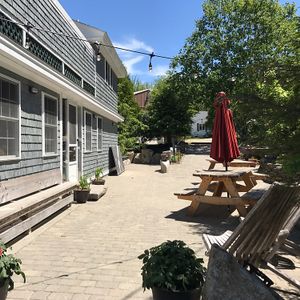 side seating outdoors at Carriage House Restaurant in East Boothbay