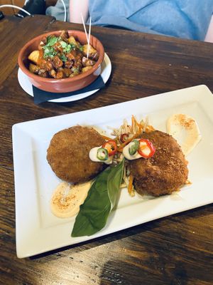 Chorizo patatas bravas and Thai crab cakes at Harmonium in Edinburgh