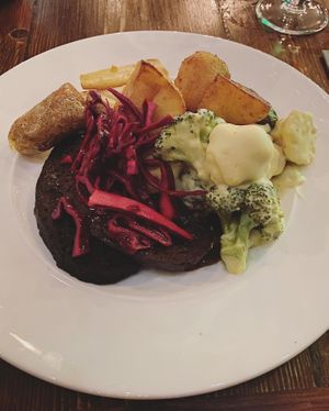 Christmas dinner! Seitan in homemade gravy, veggies with cheeze sauce, and perfect roasties  at Harmonium in Edinburgh
