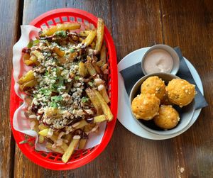 Vietnamese loaded chips. Jalapeno & cheddar cornbread hush puppies.  at Harmonium in Edinburgh
