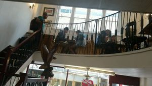 top seating area for about 10 people at New York Deli in Cardiff