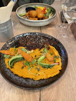 Front: glazed vegan duck and tempura bowl  at Happy Bean in Prague