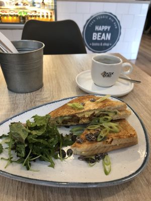 Vegan Truffle “bacon” breakfast sandwich - sooooo good and the salad with it is great too! at Happy Bean in Prague
