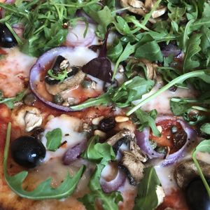 New vegan veneziana with extra rocket and mushrooms... delicious  at Pizza Express in Rochester