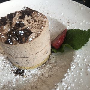 Vegan cake chocolate and amaretto on a biscuit base 💚 delicious
 at Pizza Express in Rochester