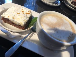 Carrot cake and soya latte at Pizza Express in Rochester