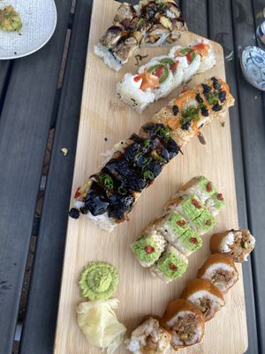 Something with shiitake, jalapeño popper, Idr the top of the middle, umami express below, Eden roll and then the cowgirl  at Blue Sushi Sake Grill in Naperville
