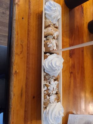 Apple pancake with vegan whipped cream at The Happy Pig Pancake Shop in Amsterdam