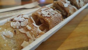 vegan pancake with Apple filling and almonds at The Happy Pig Pancake Shop in Amsterdam