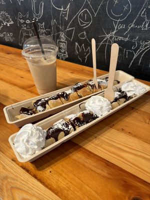 Vegan pancakes with hazelnut nut sauce (vegan) and vegan whipped cream   at The Happy Pig Pancake Shop in Amsterdam