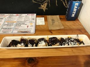 Vegan pancakes with banana and chocolate sauce at The Happy Pig Pancake Shop in Amsterdam