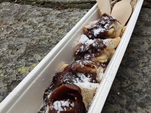 Vegan pancake with banana filling and chocolate sauce  at The Happy Pig Pancake Shop in Amsterdam