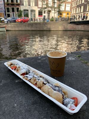 Strawberry and chocolate sauce with almonds  at The Happy Pig Pancake Shop in Amsterdam
