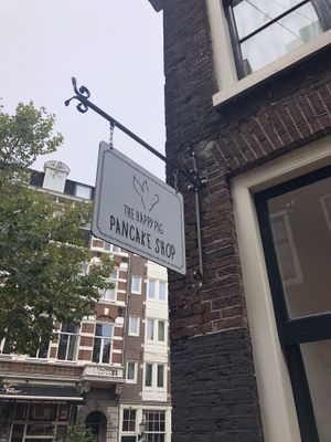 Outside  at The Happy Pig Pancake Shop in Amsterdam