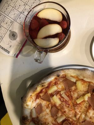 pizza with vegan ham and pineapple & a raspberry tea  at Vegan Port Pizza & Restaurant in Gdansk