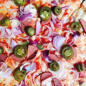 vegan pizza with salami and onions  at Vegan Port Pizza & Restaurant in Gdansk