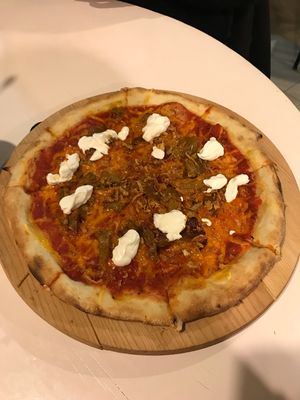 Tomato sauce, vegan cheese, seitan, garlic and sour cream pizza at Vegan Port Pizza & Restaurant in Gdansk