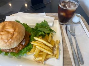 Single burger with spicy sauce and fries, coffee with soymilk at Vegetarian Beast in Tokyo