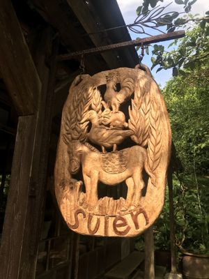 Cute sign in front of the store  at Bakery Suien in Yomitan