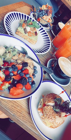vegan bacon and cheese bagel, coconut yoghurt, avocado toast and acai bowl at Flax & Kale - H&M in Barcelona