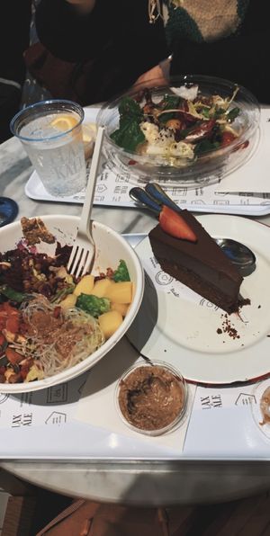 Chocolate cake and salad at Flax & Kale - H&M in Barcelona