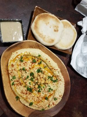 Hummus with pita and tahini at Hayahay Cafe in Mambajao