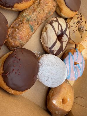 Boston cream, peanut butter chocolate, birthday cake, mocha, angel cream filled  at Fry Baby Donuts in Buffalo