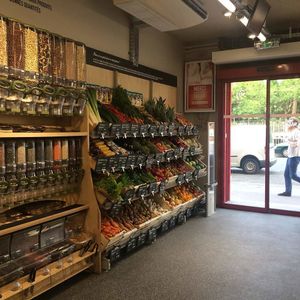 Entrance, produce section and bulk section at Naturalia Vegan - Rome in Paris
