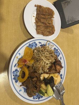 Tofu skin, seitan, noodles, spicy mushroom pineapple salad, tofu and a sour fruit   at Zhun San Yen Vegetarian in Kuching