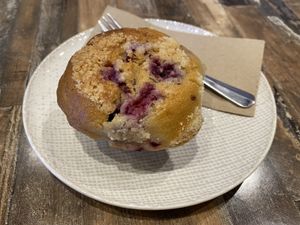 Vegan raspberry muffin  at Olivia Spring Cafe in Moonee Ponds