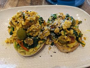 Scrambled tofu and avocado on toast at Olivia Spring Cafe in Moonee Ponds