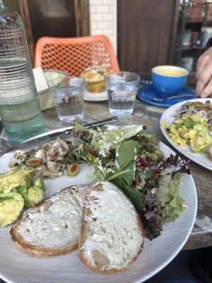 Pickled mushroom salad and muffin   at Olivia Spring Cafe in Moonee Ponds