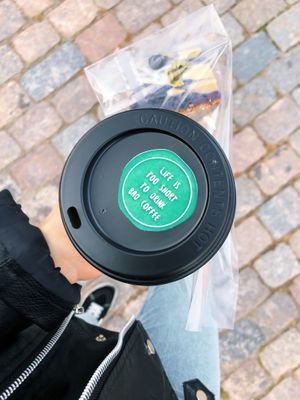 Golden Latte to go + blueberry cheesecake  at OAS Cafe in Kalmar