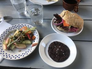 Beet root hummus sandwhich with side salad. Brownie cookie   at Cafe Nyfiket in Raettvik