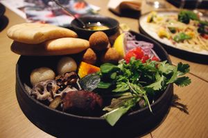 Vegan falafel plate with pita and veggies at Cosme Kitchen Adaptation - Omotesando Hills in Tokyo