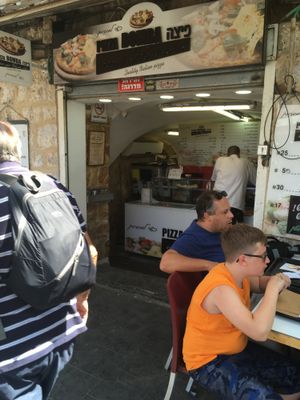 Storefront (Open for business) at Pizza Bomba in Jerusalem