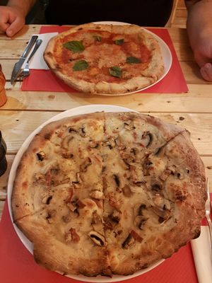 Carbonara & Margherita pizzas. so good!!!!  at Masa Madre in Madrid