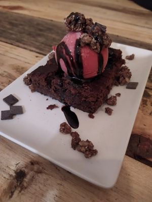 Vegan Brownie with ice-cream and choc sauce at Masa Madre in Madrid