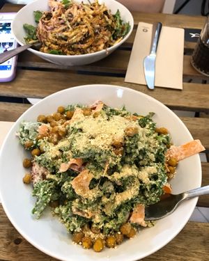 Kale Caesar and raw noodle salad in the back  at Bunny's Deli in Madrid