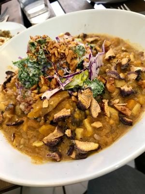 Pumpkin & Mushroom Curry with Coriander Infused Wild Rice at Bunny's Deli in Madrid