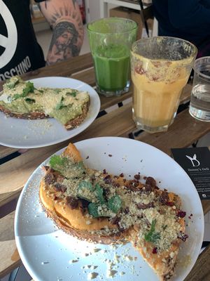 Avocado sourdough, tomato and cashew cream sourdough and smoothies!  at Bunny's Deli in Madrid