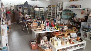 Very sweet shop, in the back you can see the corner with a lot of vegan options. at Nina Coop Store in Povoa De Varzim