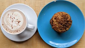 hot cocoa and Shoofly Bakery cardamom coffee cake muffin at Jet Black Coffee Company - Gateway in Portland